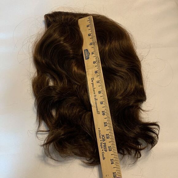 Brown wavy wig. Combs smoothly like hair.  Not sure if it's real/synthetic. - Picture 11 of 14